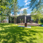 Picture of a well-maintained property with trees.